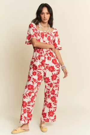 wholesale clothing floral short sleeve smocking flowy jumpsuit davi & dani